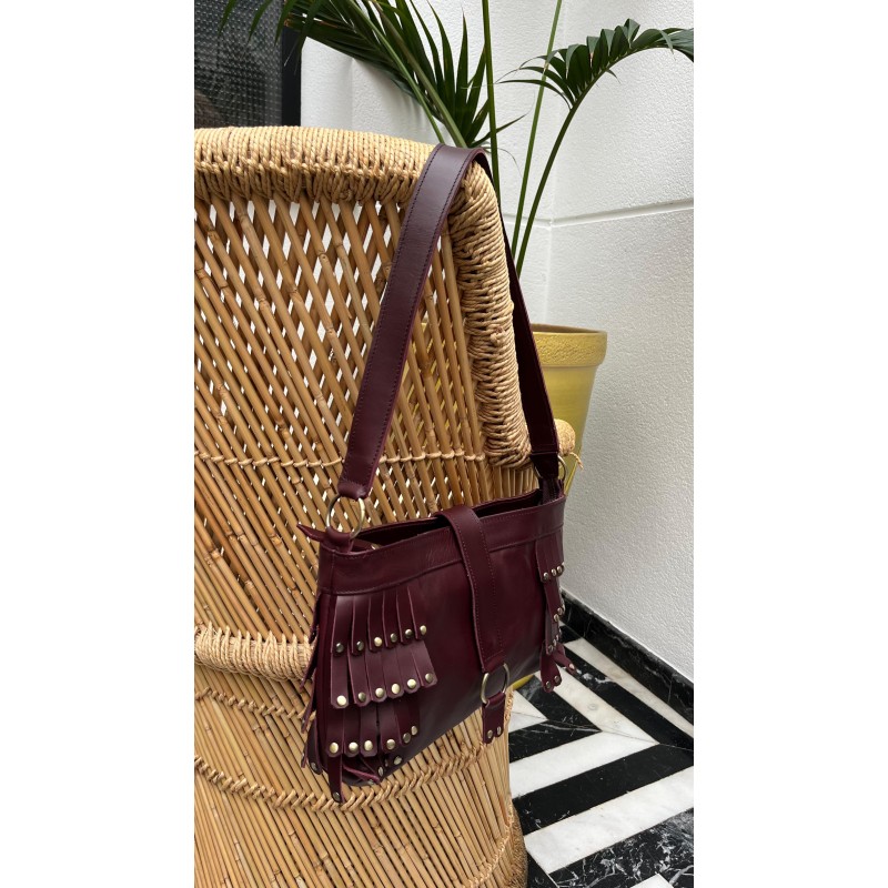 Bolso flecos con tachas piel