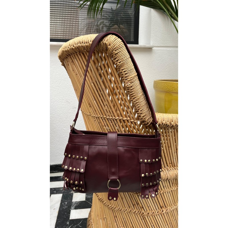 Bolso flecos con tachas piel