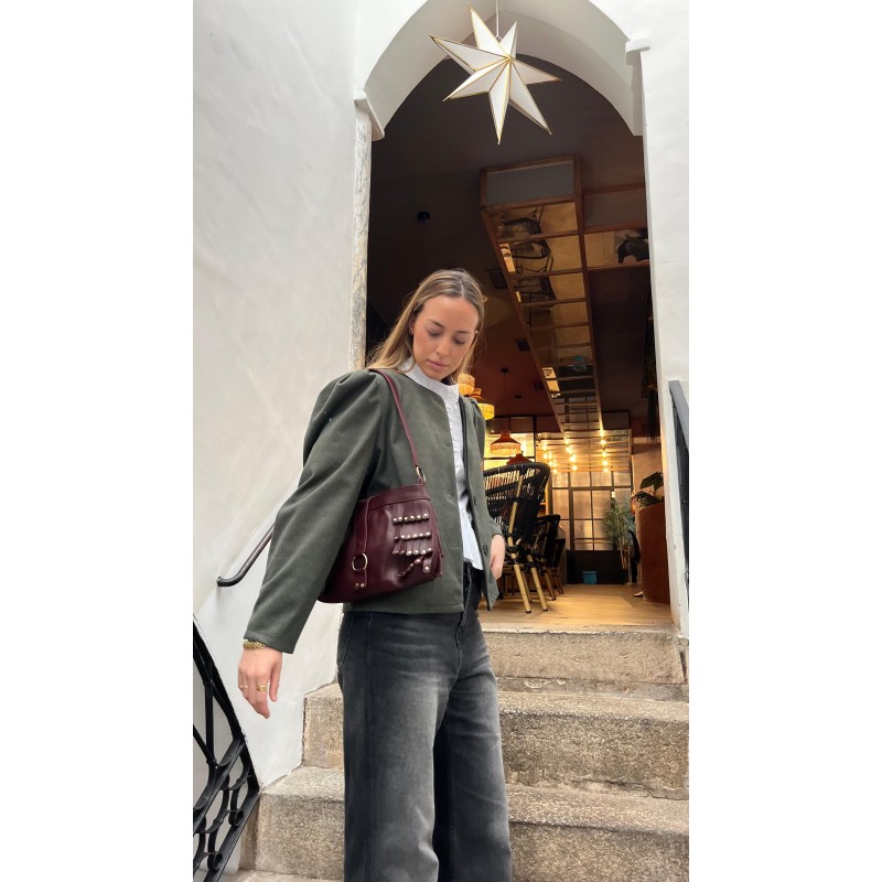 Bolso flecos con tachas piel