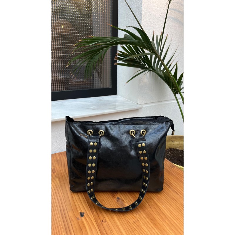 Bolso piel tachas asas