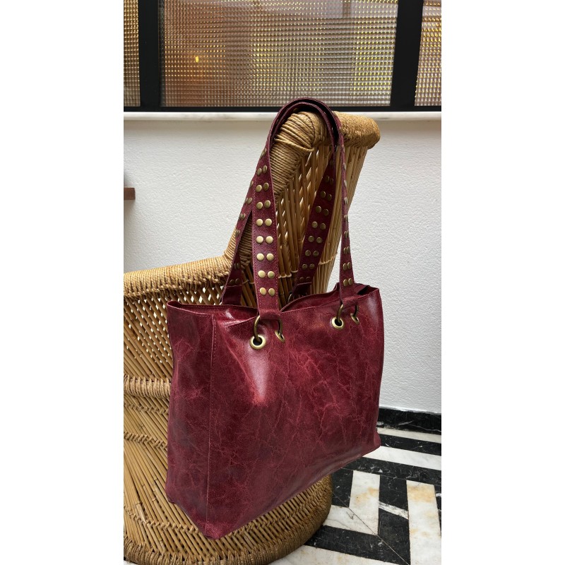 Bolso piel tachas asas