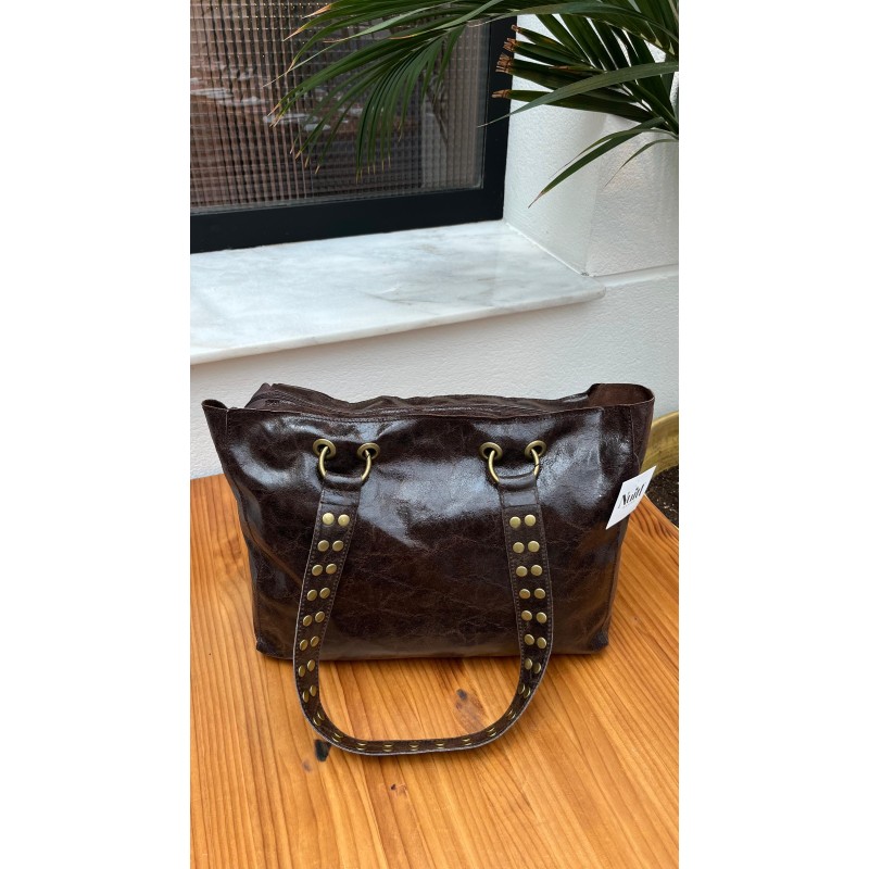 Bolso piel tachas asas